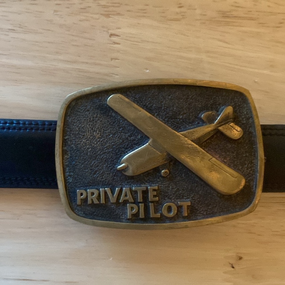 BASIC TOOL SUPPLY- PRIVATE PLANE - Brass belt buckle. Made in USA, cali- 1978